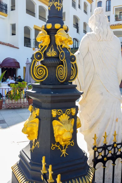 Antique lamp with wrought iron ornaments — Stock Photo, Image