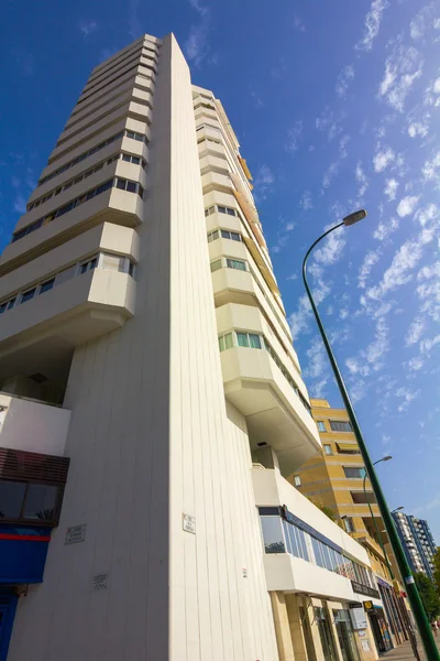 Modern skyscrapers in white on blue sky perspective — Stock Photo, Image