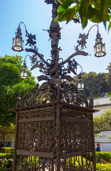 Wrought iron cross highly decorated in a park in Seville, Spain — Stock Photo, Image