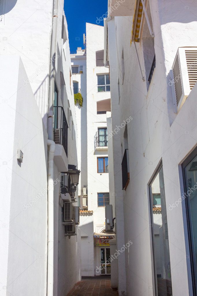 streets with whitewashed buildings typical of Puerto Banus, Mala