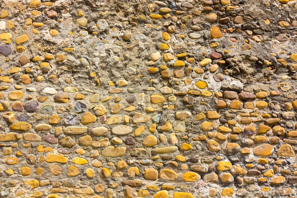Duvar arka plan küçük taşlarla — Stok fotoğraf