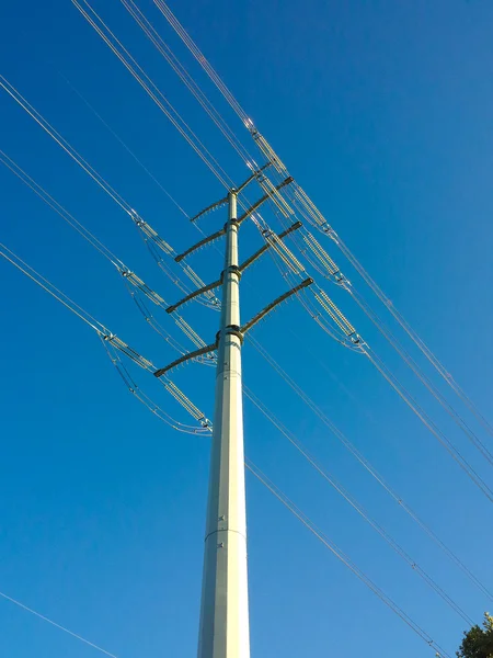 Modern electric tower on blue sky — Stock Photo, Image