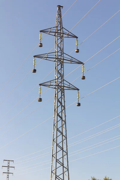 Modern electric tower on blue sky — Stock Photo, Image