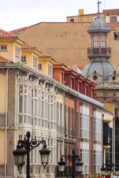 Typical beautiful and colorful buildings in the city of Llanes i — Stock Photo, Image