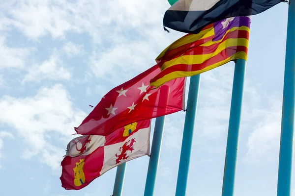 Regional flags of Spain in the wind — Stock Photo, Image