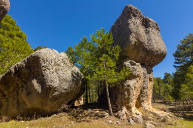 Rocks with capricious forms in the enchanted city of Cuena, Spain clipart