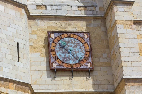 Ancient clock on the facade of a ediufucinen Aviles Spain — Stock Photo, Image