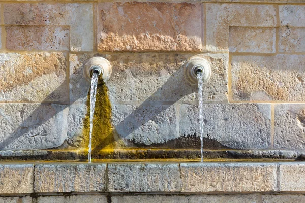 Ancient water fountain water pipes — Stock Photo, Image
