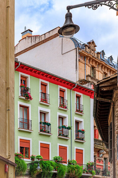 Colorful house facades in Pamplona Spain, town famous for bull running