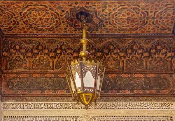 Moroccan lantern and cedar wood carved ceiling — Stock Photo, Image