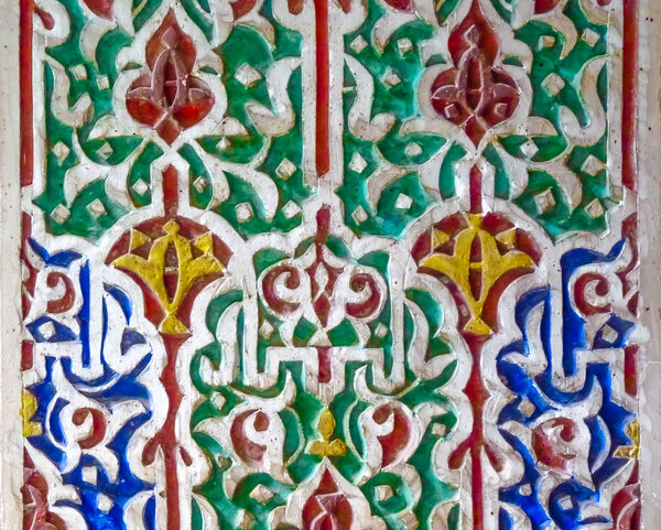 Decorative alabaster wall carvings in a Moroccan riad