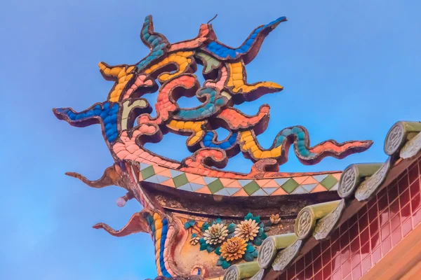 Roof ornament of a buddhist temple — Stock Photo, Image