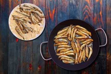 Boquerones fritos Mediterranean fried anchovies  clipart