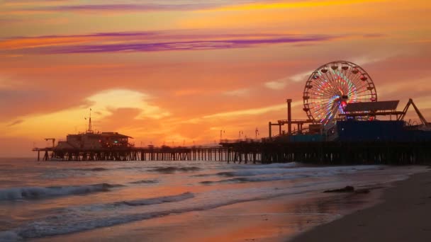 Santa Monica California sunset on Pier Ferris wheel and reflection on beach — Stock Video