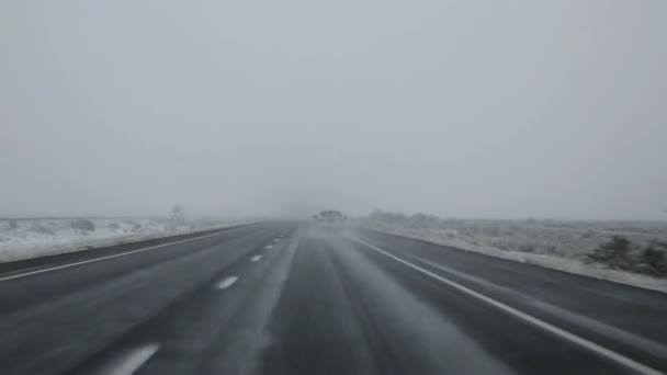 US snowing I 15 interstate snowed road driving in Nevada — Stock Video