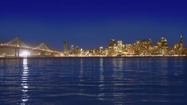 San Francisco sunset skyline in California with reflection in bay water — Stock Video