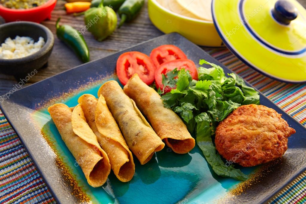 Mexican flautas rolled tacos with salsa — Stock Photo © lunamarina