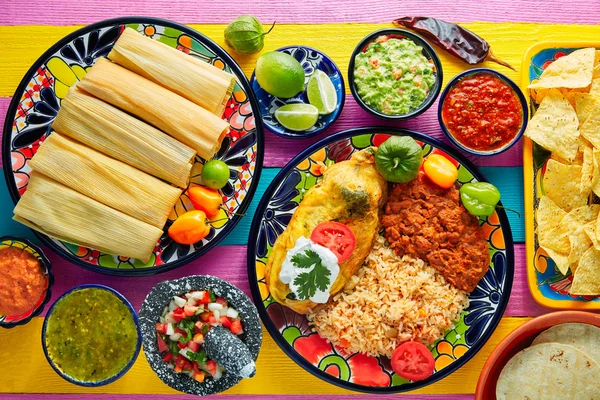 Tamale with corn leaf and filled chili pepper — Stock Photo, Image