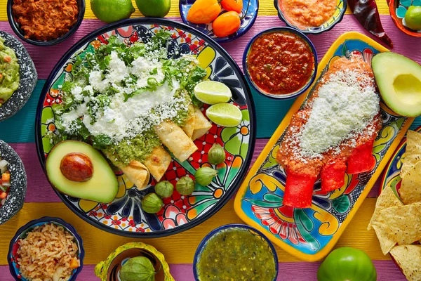 Green and red enchiladas with mexican sauces — Stock Photo, Image