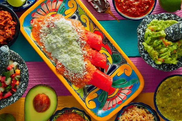Red enchiladas Mexican food with guacamole — Stock Image Red enchiladas Mexican food with guacamole Stock Photo