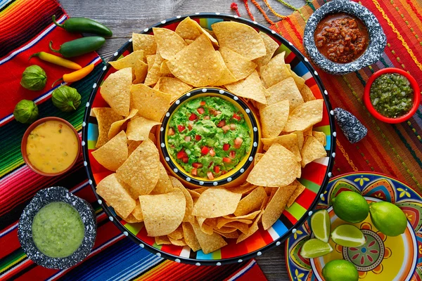 Nachos with guacamole tortilla chips sombrero — Stock Photo, Image