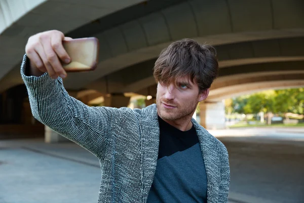 Modern young man smartphone taking selfie — Stock Photo, Image