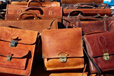 leather bags in a row from Morocco Africa clipart
