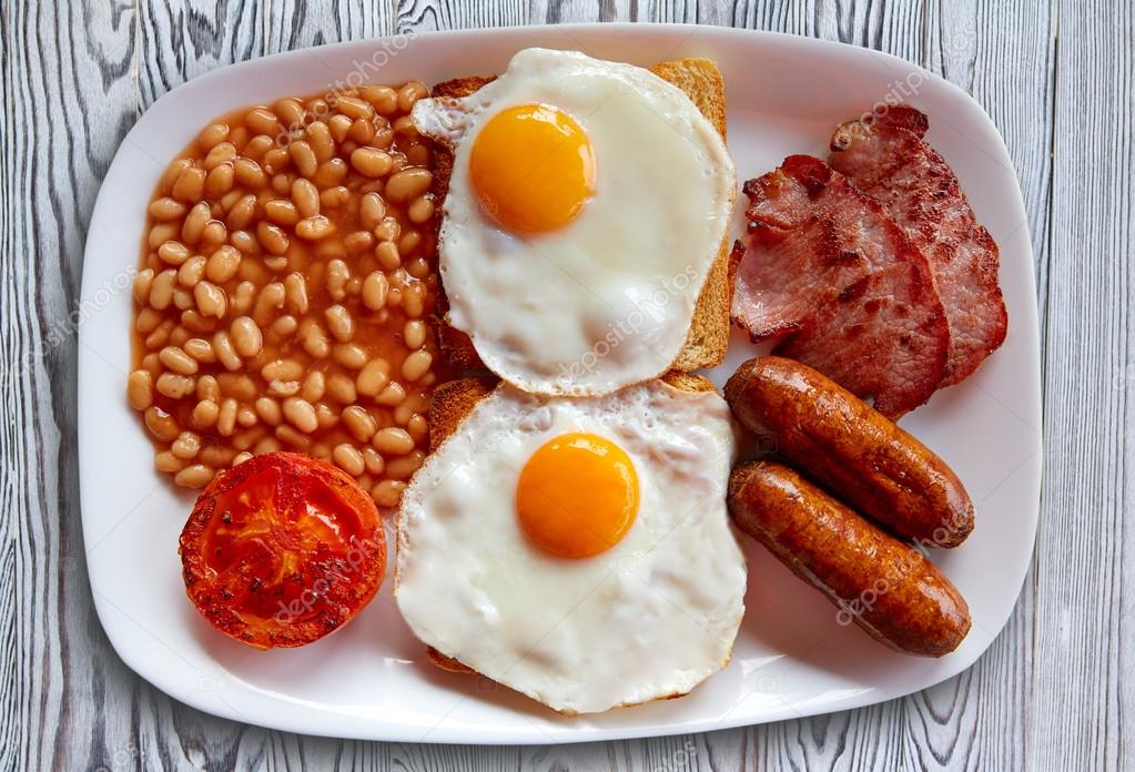 English breakfast with two eggs sausage beans Stock Photo by ...