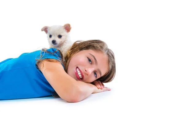 Puppy chihuahua dog on kid girl lying happy smiling — Stock Photo, Image