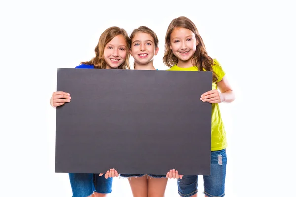 Happy kid girls holding black board copyspace — Stock Photo, Image