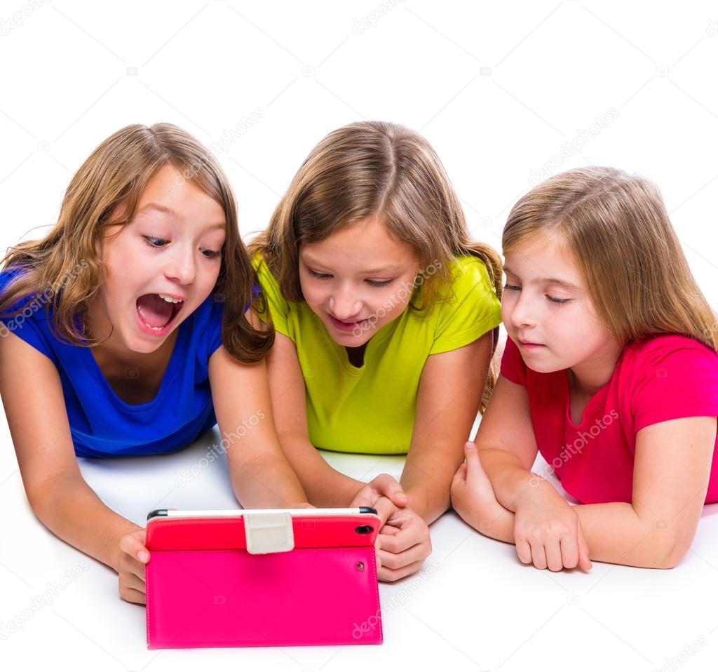 sisters kid girls with tech tablet pc playing happy