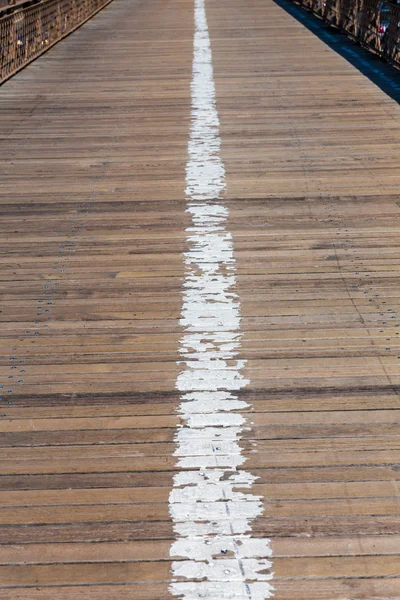 Brooklyn bridge wooden soil pavement detail NY — Stock Photo, Image