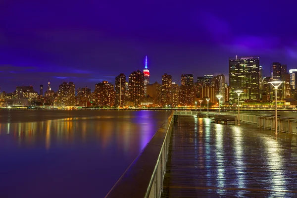 Zonsondergang skyline van Manhattan New York uit Oosten — Stockfoto