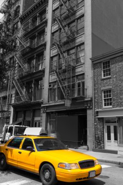 New York Soho buildings yellow cab taxi NYC USA clipart