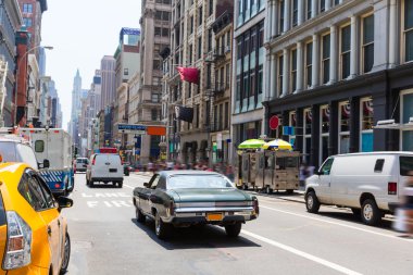 Soho street traffic in Manhattan New York City US clipart