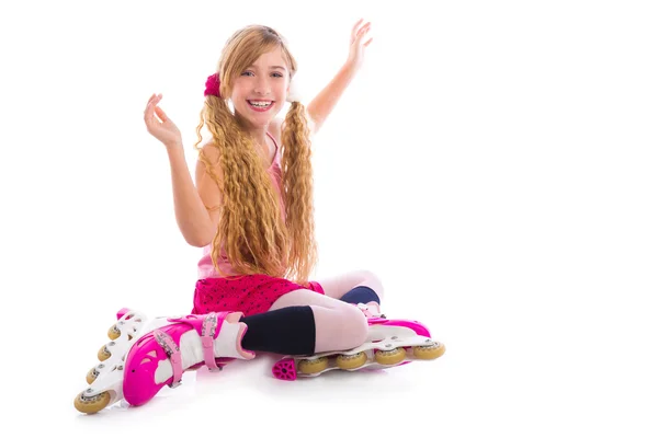 Blond pigtails roller skate girl sitting happy — Stock Photo, Image