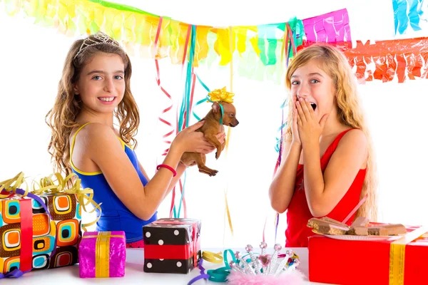 Girl friends party excited with puppy dog present — Stock Photo, Image