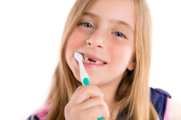 Blond kid indented girl cleaning teeth toothbrush — Stock Photo, Image