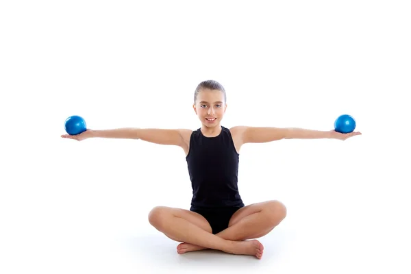 Fitness weighted Pilates balls kid girl exercise — Stock Photo, Image