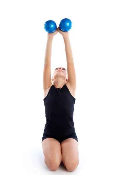 Fitness weighted Pilates balls kid girl exercise — Stock Photo, Image