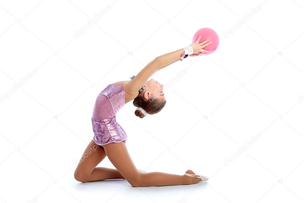 Kid girl ball rhythmic gymnastics exercise on white