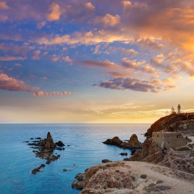 Almeria Cabo de Gata lighthouse sunset in Spain clipart