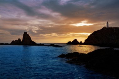 Almeria Cabo de Gata deniz feneri günbatımı İspanya