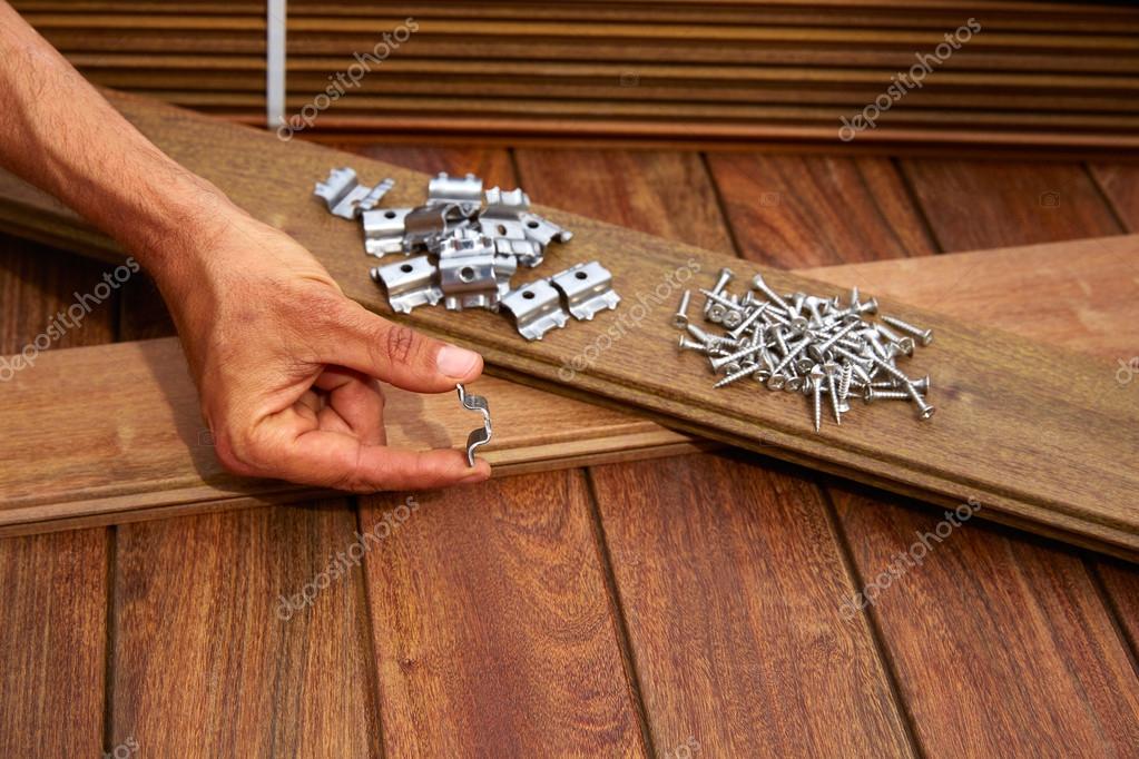 Ipe deck wood installation screws clips fasteners Stock Photo by