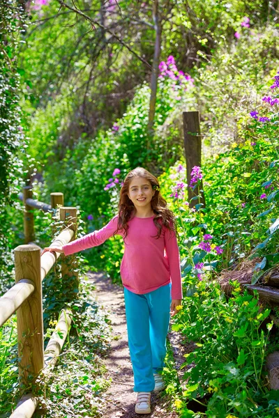 Kid girl in spring track in Cuenca forest of Spain — Stock Photo, Image