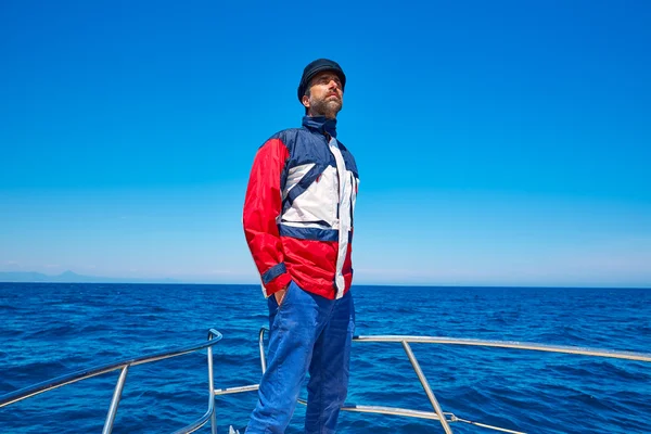 Beard sailor cap man sailing sea ocean in a boat — Stock Photo, Image