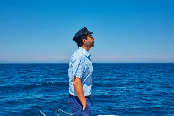 Beard sailor cap man sailing sea ocean in a boat — Stock Photo, Image