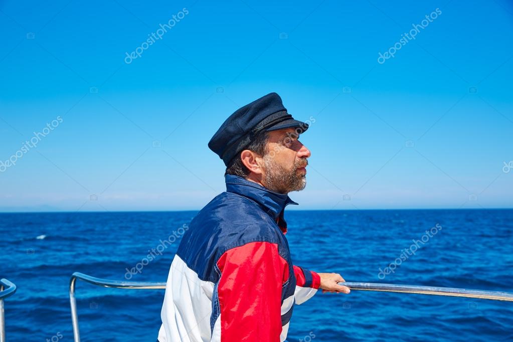 Beard sailor cap man sailing sea ocean in a boat Stock Photo by ©lunamarina  75544475