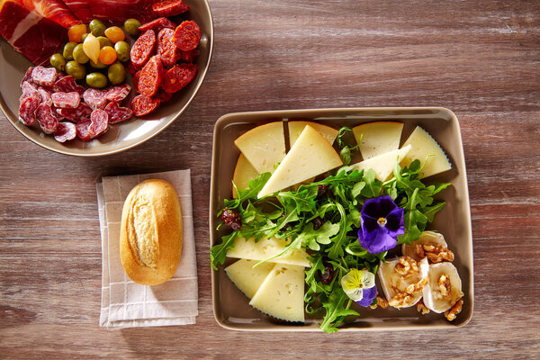 Spain food tapas ham sausage and cheese salad