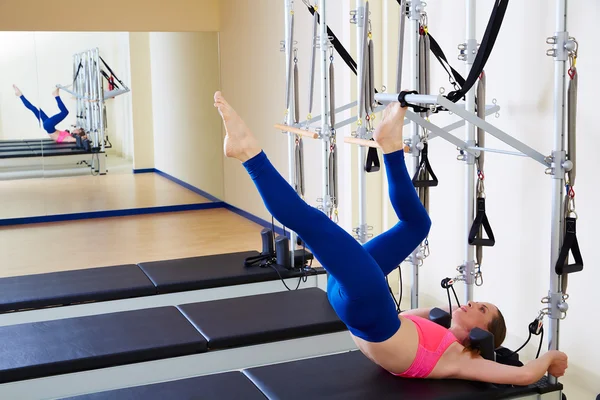 Pilates reformer woman tower exercise — Stockfoto